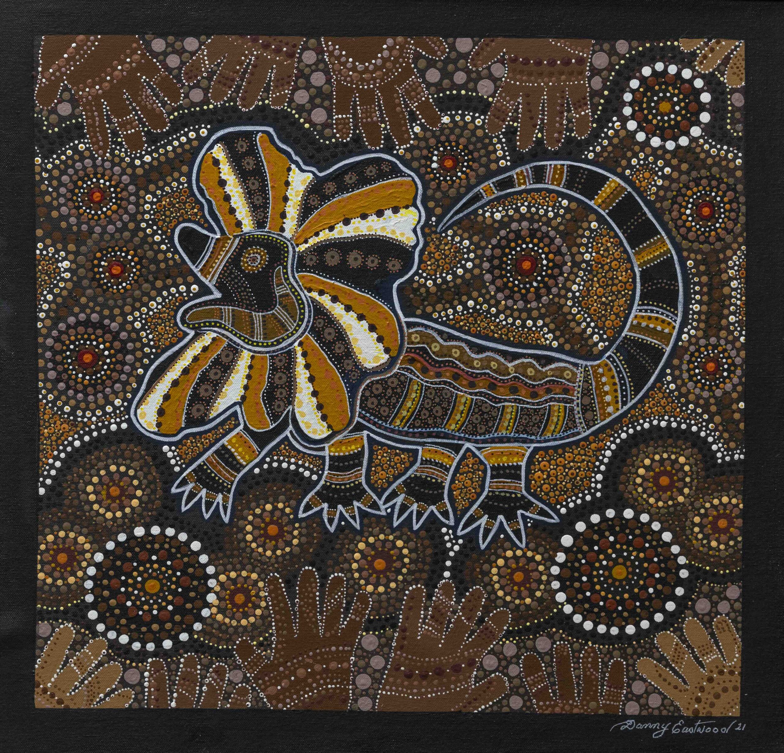 Australian dot-painting style artwork with brown, black and orange dotted swirls and a large yellow-orange petal motif outlined in white; signature 'Danny Eastwood 21'