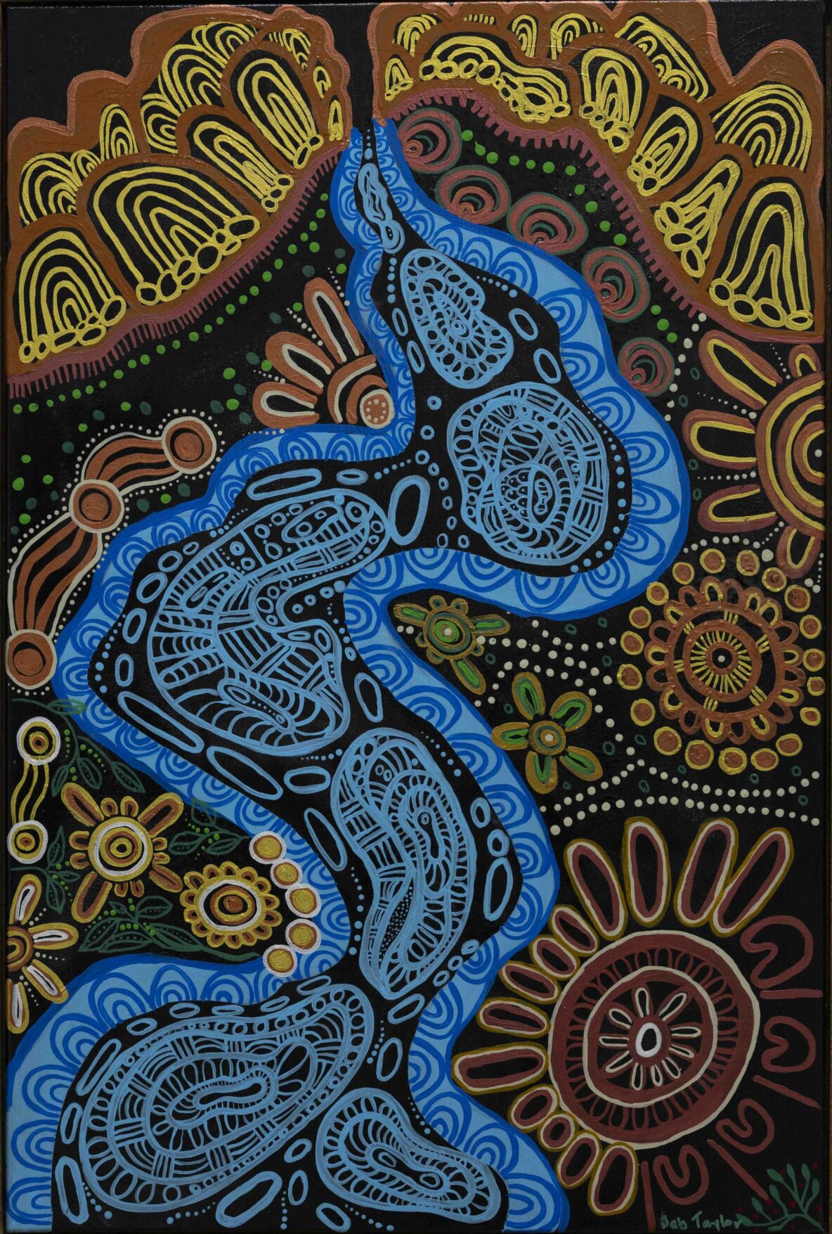 Abstract painting of a blue, patterned snake-like ribbon winding through black space with orange-yellow floral motifs above and around it.