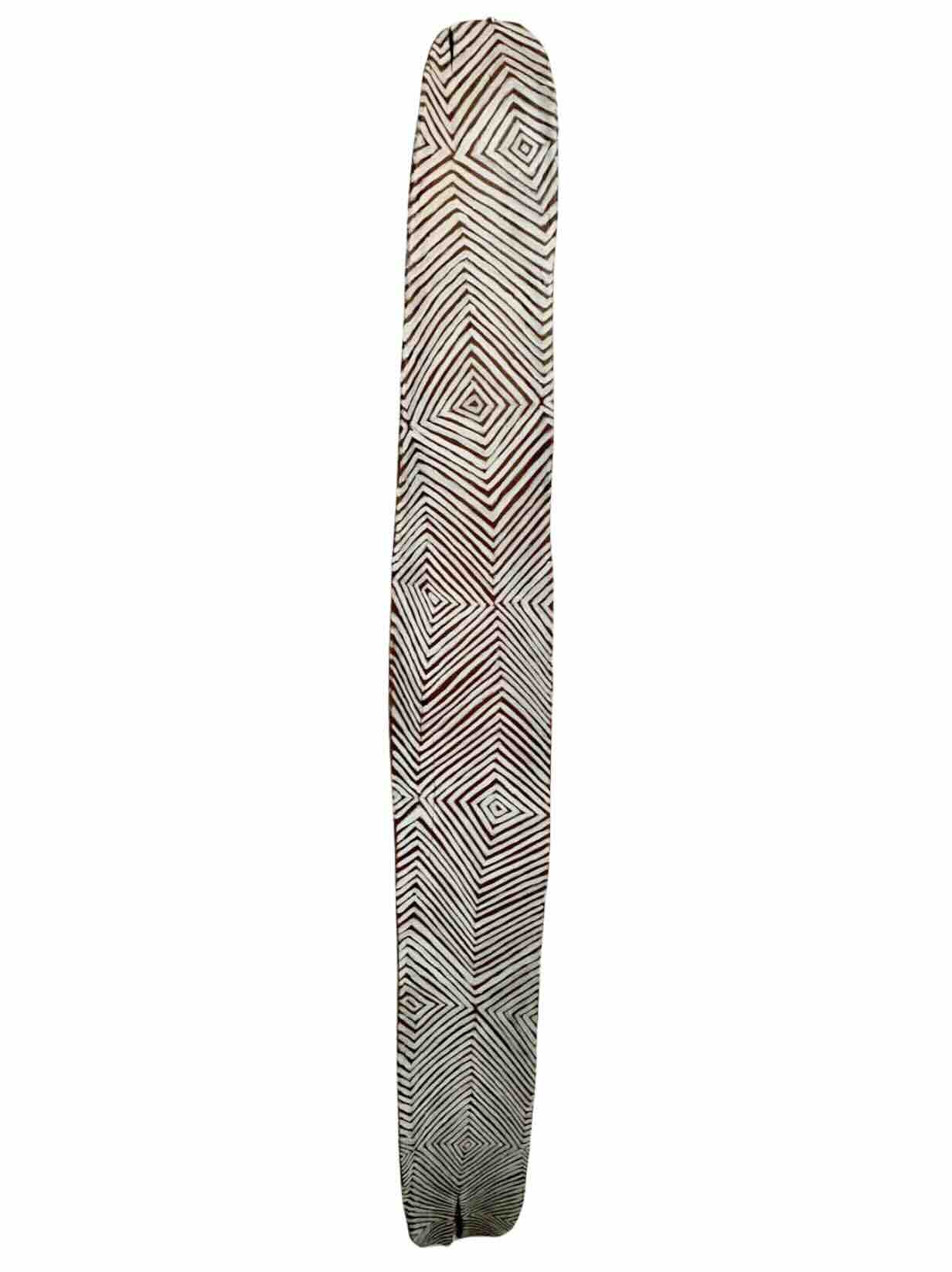 Long, narrow longboard with a black-and-white geometric spiral pattern running along its length