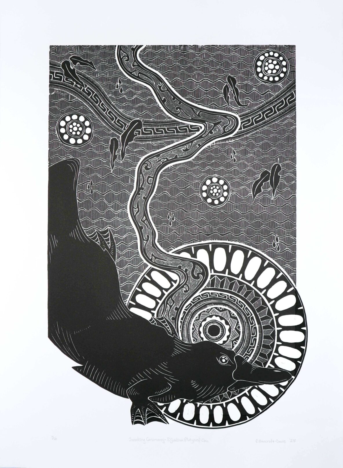 Aboriginal-style black-and-white print featuring a long, twisting serpent with intricate internal patterns, surrounded by circular, dotted motifs and wavy background lines with a dark silhouette in the foreground.